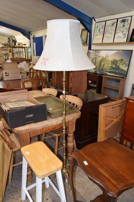 Lot 300 - A brass standard lamp