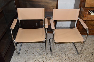 Lot 336 - A pair of 20th Century chrome framed armchairs
