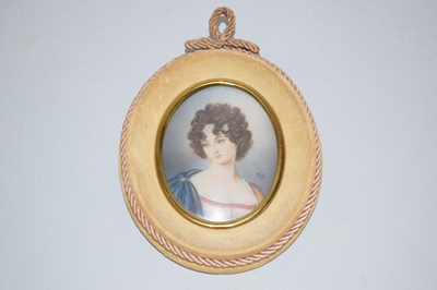 Lot 84 - A small head and shoulders portrait of a young...
