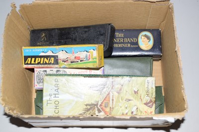 Lot 501 - One box of assorted mouth organs, echo harp etc