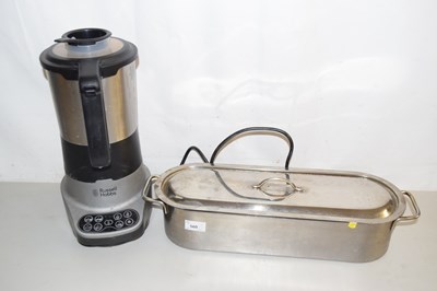 Lot 560 - A metal fish kettle and a blender