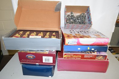 Lot 559 - A collection of modern chess sets to include...
