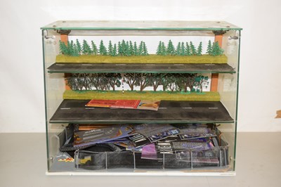 Lot 593 - A glass counter top display cabinet