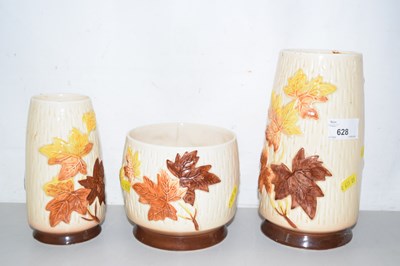 Lot 628 - A group of three Sylvac leaf decorated vases