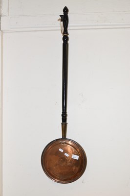 Lot 672 - A copper bed warming pan