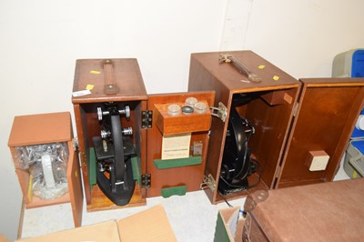 Lot 698 - A group of three students microscopes