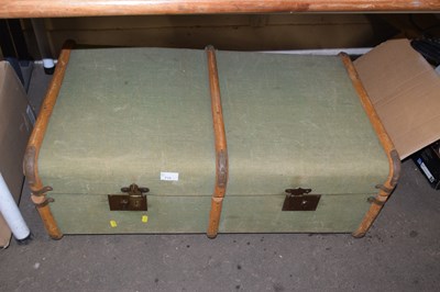 Lot 715 - A vintage wooden bound steamer trunk