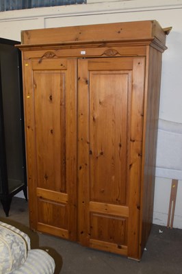 Lot 727 - A modern pine wardrobe