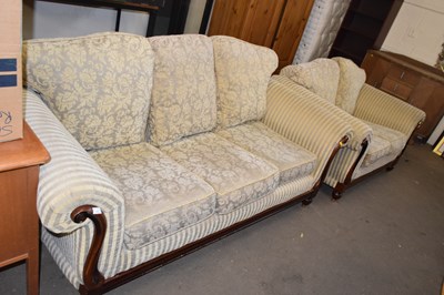 Lot 778 - A striped three seater sofa and matching two...