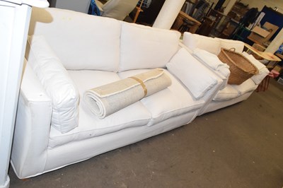 Lot 785 - A pair of two seater sofas with pale upholstery