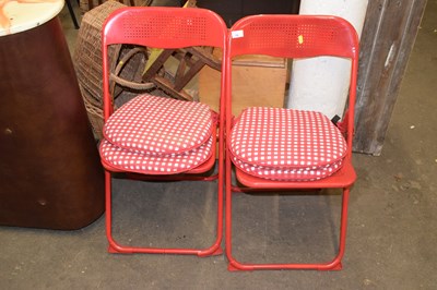 Lot 788 - A pair of red folding metal chairs