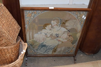 Lot 792 - A needlework fire screen, the panel decorated...