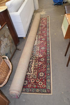 Lot 793 - A 20th Century machine made floor rug