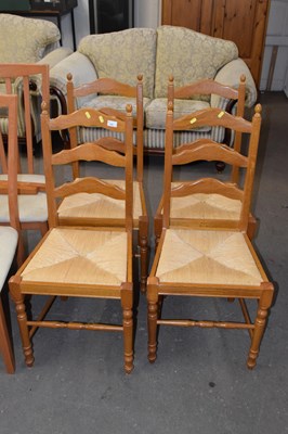 Lot 799 - Set of four rush seated kitchen chairs