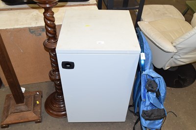 Lot 811 - A metal single door cupboard