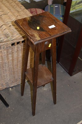 Lot 817 - An oak plant stand