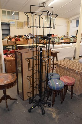 Lot 820 - A revolving shop display rack