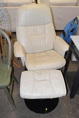 Lot 826 - A Stressless style armchair and stool