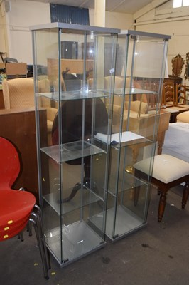 Lot 831 - A pair of modern display cabinets
