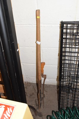 Lot 842 - A sickle and two brush cutters