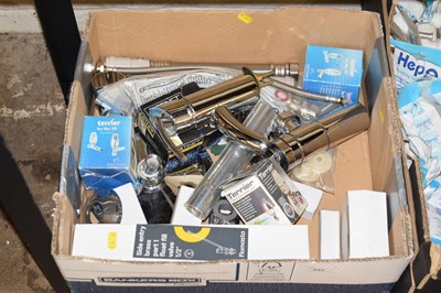 Lot 853 - One box of various taps and other plumbing...