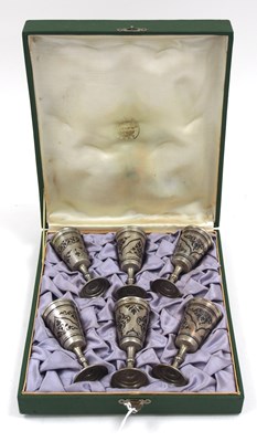 Lot 76 - A cased set of six Russian Niello goblets,...