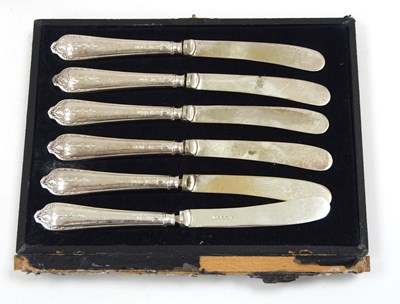 Lot 83 - A cased set of six silver handled tea knives...