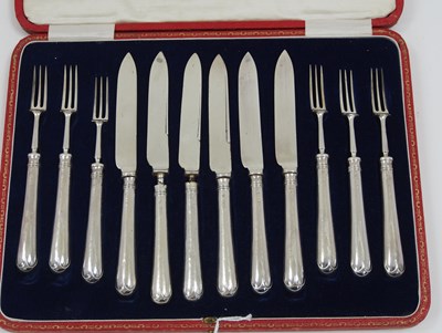 Lot 87 - A cased set of six silver handled tea knives...