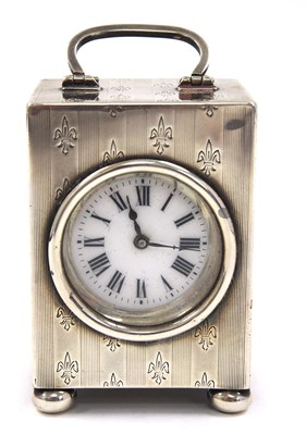 Lot 95 - An Edwardian silver boudoir clock of...
