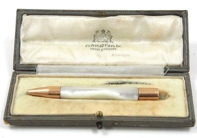 Lot 96 - A cased mother of pearl and 9ct gold mounted...