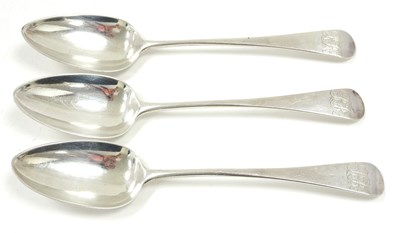 Lot 107 - A group of three George III silver serving...