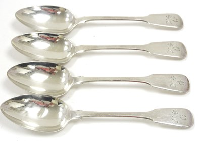Lot 109 - A group of four fiddle pattern silver serving...