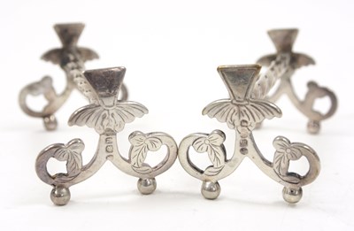 Lot 180 - A pair of Georgioan IV silver knife rests with...