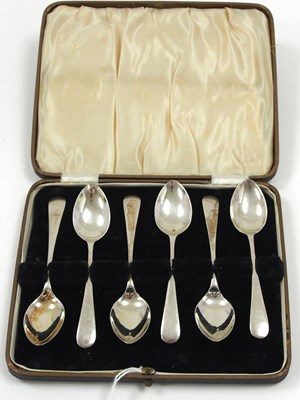Lot 143 - A cased set of six George V silver teaspoons,...