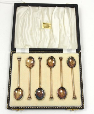 Lot 146 - A cased set of six silver gilt and enamel...
