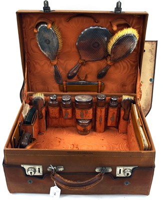 Lot 154 - A leather and silver dressing table box with...