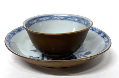 Lot 203 - A Chinese porcelain tea bowl and saucer from...
