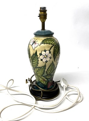 Lot 241 - A Moorcroft lamp decorated with birds and...