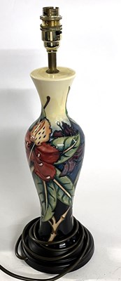 Lot 268 - A Moorcroft lamp in the Anna Lily pattern...