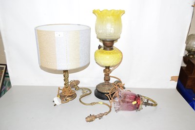 Lot 3 - A Victorian oil lamp with yellow tinted shade,...