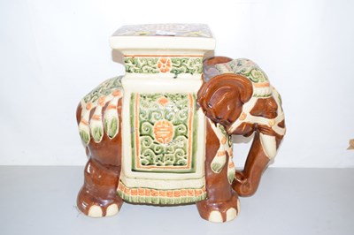 Lot 4 - A ceramic jardiniere stand formed as an elephant