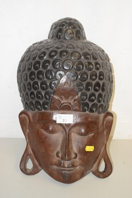 Lot 22 - A 20th Century Asian carved wall mask