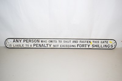 Lot 38 - An iron LNER sign marked "Any Person Who Omits...