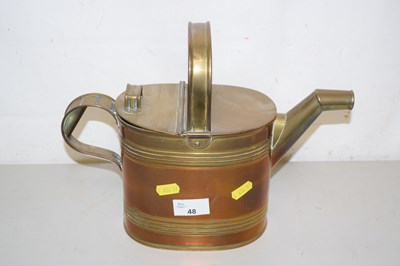 Lot 48 - A brass water jug