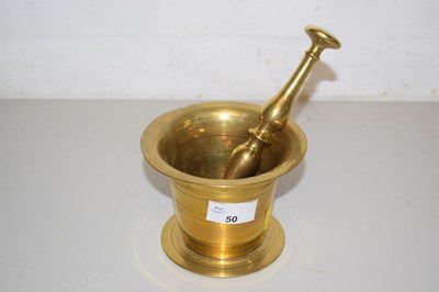 Lot 50 - Brass pestle and mortar