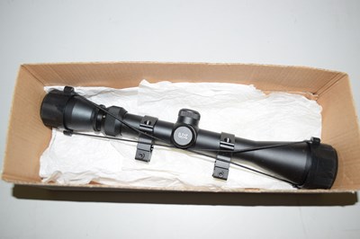 Lot 51 - A riifle sight marked UX