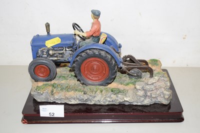 Lot 52 - A resin model of a vintage tractor