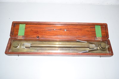 Lot 58 - A brass architects ruler in wooden case