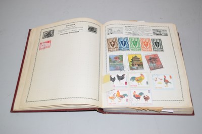 Lot 60 - A Triumph stamp album containing a largely...
