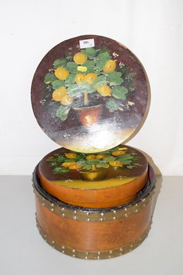 Lot 160 - A set of stacking boxes decorated with lemon...